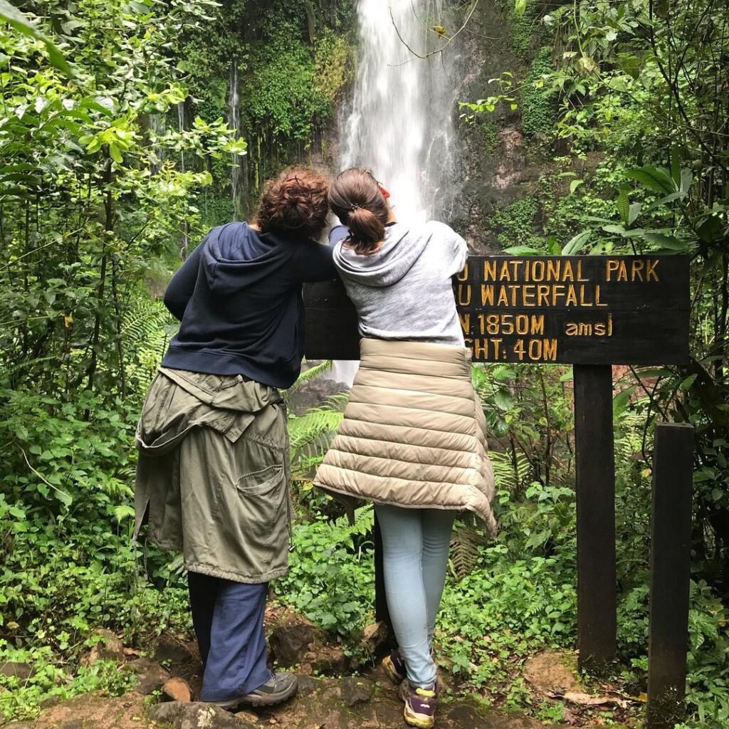 Tourists at kilimanjaro marangu water falls